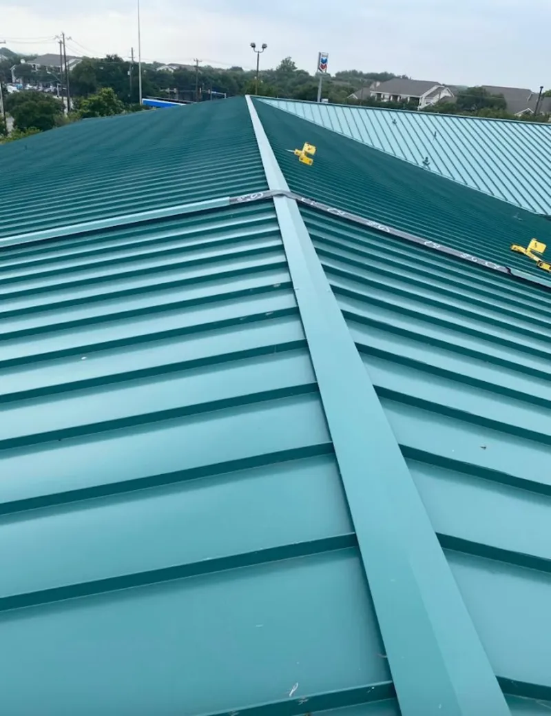 Green commercial metal roof ridge and valley for Metal Roof Repair in Pound Ridge