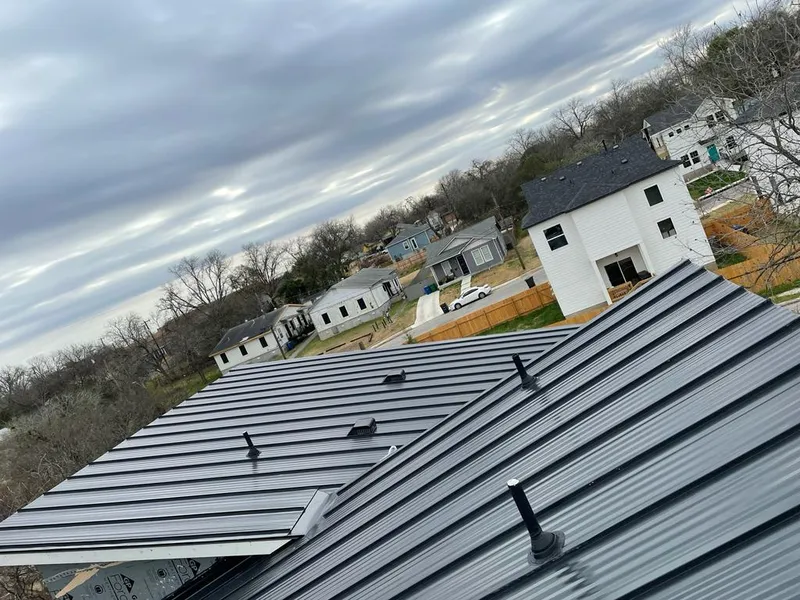 Standing seam metal roof panels with vents for Skylight Repair in Pound Ridge